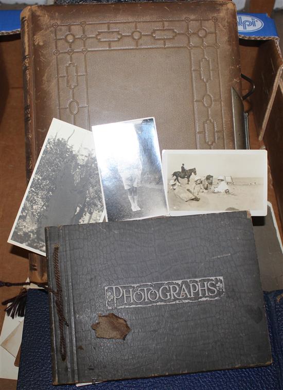 2 leather photo albums, 2 others & loose photos